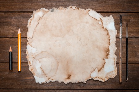 Vintage Still-Life With Paper, Brushes And Pencils On Wooden Tableの写真素材