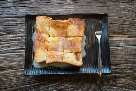 Toast bread with milk on the wood table