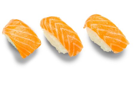 Three sushi nigiri on black backgroundの写真素材