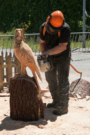 man carving woodの写真素材