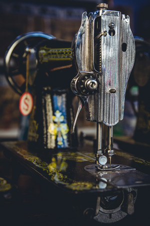 Heavy duty vintage Singer sewing machines for sale as seen in a shop in Yangon, Myanmar.の写真素材