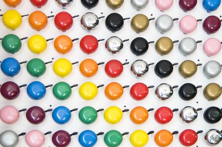 collection of colored bicycle bellsの写真素材