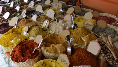 food spices in the colorful medieval marketの写真素材