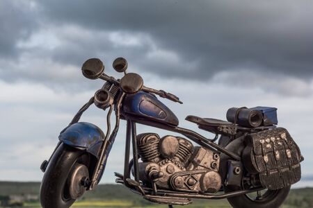 custom motorcycle with clouds in the background