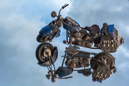 custom motorcycle reflection with clouds in the backgroundの写真素材