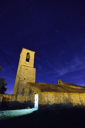 the church tower at nightの写真素材