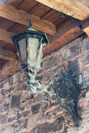 old street lamp covered in cobwebsの写真素材