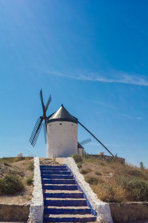 Closeup of colorful stairs to reach a windmill in Consuegra, Toledo, Castilla la Mancha, Spainの写真素材