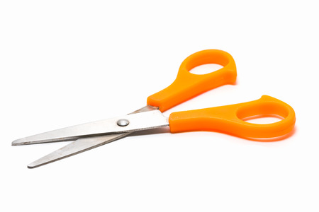 Yellow scissors isolated on a white backgroundの写真素材