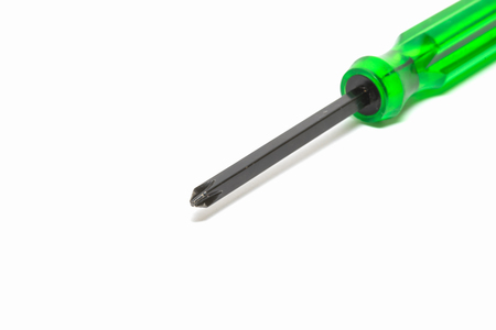 green screwdriver isolated on white backgroundの写真素材