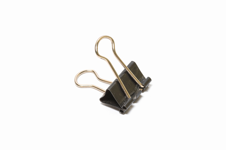 Black Paper clip isolated on white background.の写真素材