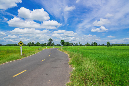 Asphalt road and blue skyの写真素材