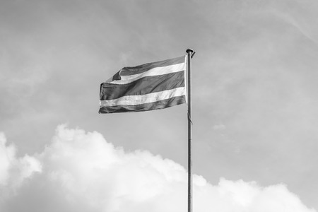 thailand flag with nice sky on flagstaff ,black and whiteの写真素材