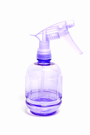foggy spray bottle isolated on white backgroundの写真素材