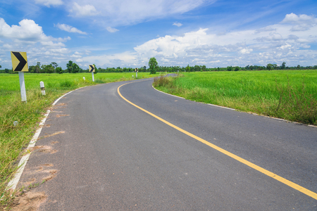Asphalt road and blue skyの写真素材