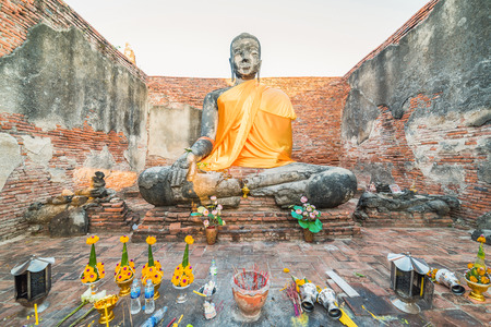 Asian religious architecture. Ancient sandstone sculpture of Buddha at Wat Phra Sri Sanphet temple ruins . Ayutthaya, Thailand travel landscape and destinationsの写真素材