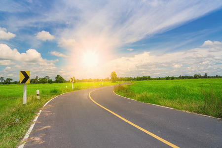 Asphalt road and blue skyの写真素材