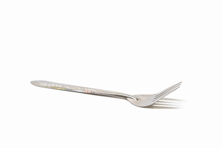 Silver fork on white backgroundの写真素材