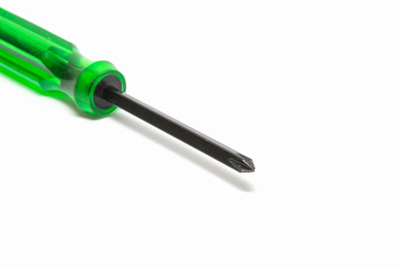 green screwdriver isolated on white backgroundの写真素材