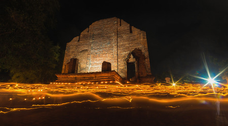 Light waving of candle rite walk at Maheyong Temple in Ayutthaya, Thailand.の写真素材