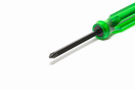 green screwdriver isolated on white backgroundの写真素材