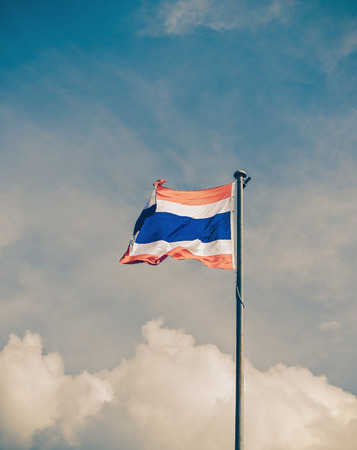 thailand flag with nice sky on flagstaff ,vintageの写真素材