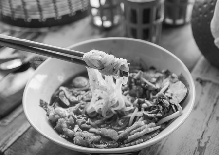 bowl of thai style beef noodle soup , black and whiteの写真素材