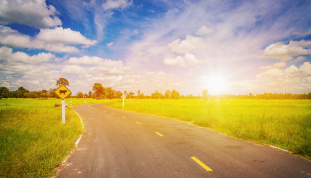 Asphalt road and blue skyの写真素材