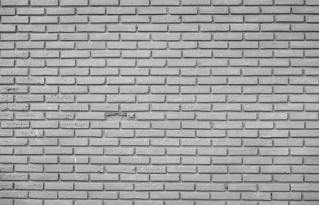 Old brick wall texture background , black and whiteの写真素材