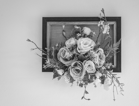 Fake flowers with white wall , black and whiteの写真素材