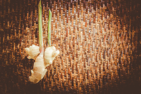 Ginger root on the Weave threshing basket , vintageの写真素材