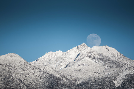 top of mountains ,moonの写真素材