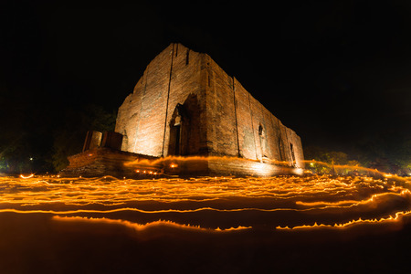 Light waving of candle rite walk at Maheyong Temple in Ayutthaya, Thailand.の写真素材