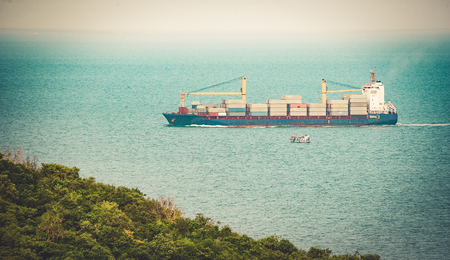 cargo ship sailing on the sea , vintageの写真素材
