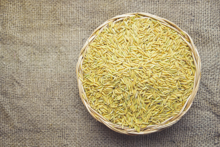 paddy on wicker baskets on the sack cloth vintageの写真素材