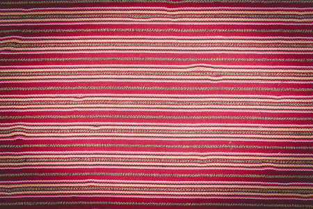 Colorful thai silk handcraft peruvian style rug surface close up More this motif & more textiles peruvian stripe beautiful background tapestry persian nomad detail pattern farabic fashionable textile.の写真素材