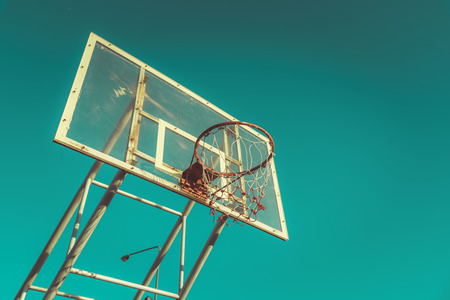 Basketball hoop on a blue sky , vintage toneの写真素材