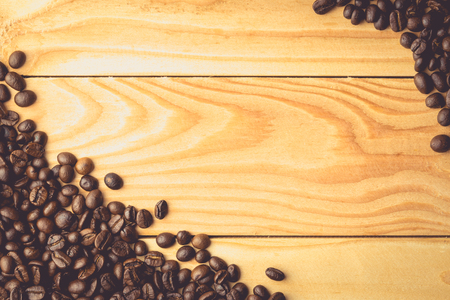 Coffee beans on the table. Free space for your text , vintage toneの写真素材