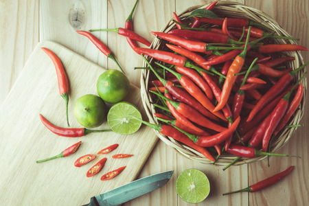 Sliced red chili pepper on a cutting board , vintage toneの写真素材