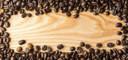 Coffee beans on the table. Free space for your textの写真素材