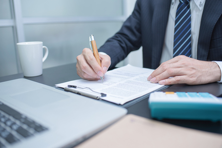 Man Analysis Business Accounting. Close-up photoの写真素材