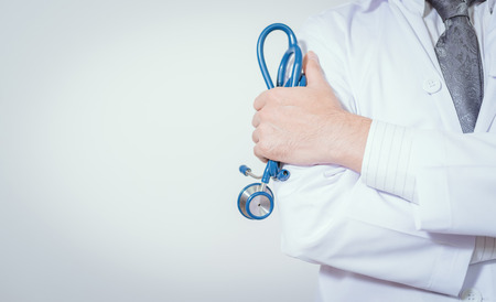 Doctor with a stethoscope in the hands