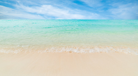 Wave of the sea on the sand beach.の写真素材