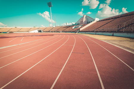 Red running track in stadium , vintageの写真素材