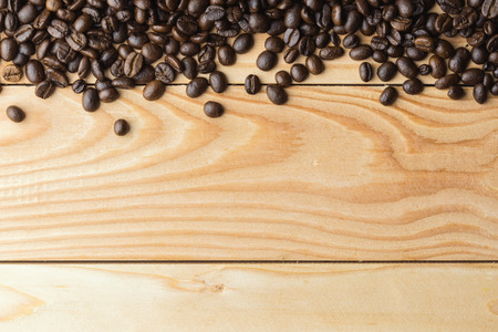 Coffee beans on the table. Free space for your textの写真素材