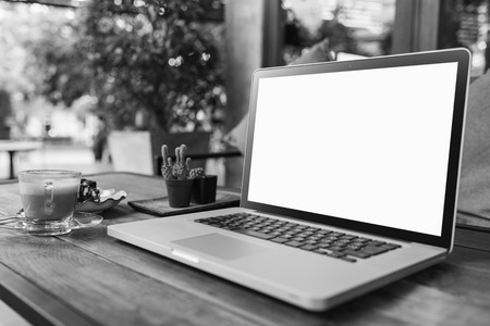 Laptop with coffee cup home office. , black and whiteの写真素材