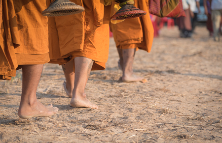 Feet of a Buddhist monk in the morning walk
の写真素材