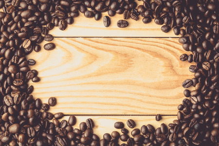 Coffee beans on the table. Free space for your text , vintage toneの写真素材