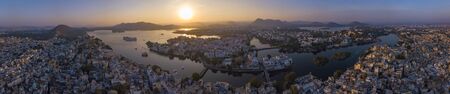 Aerial view of Udaipur City Palace In The sunset Panorama View. Udaipur, Indiaの写真素材