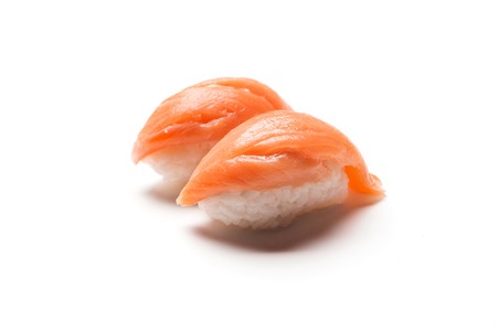 Traditional japanese salmon sushi isolated on white backgroundの写真素材